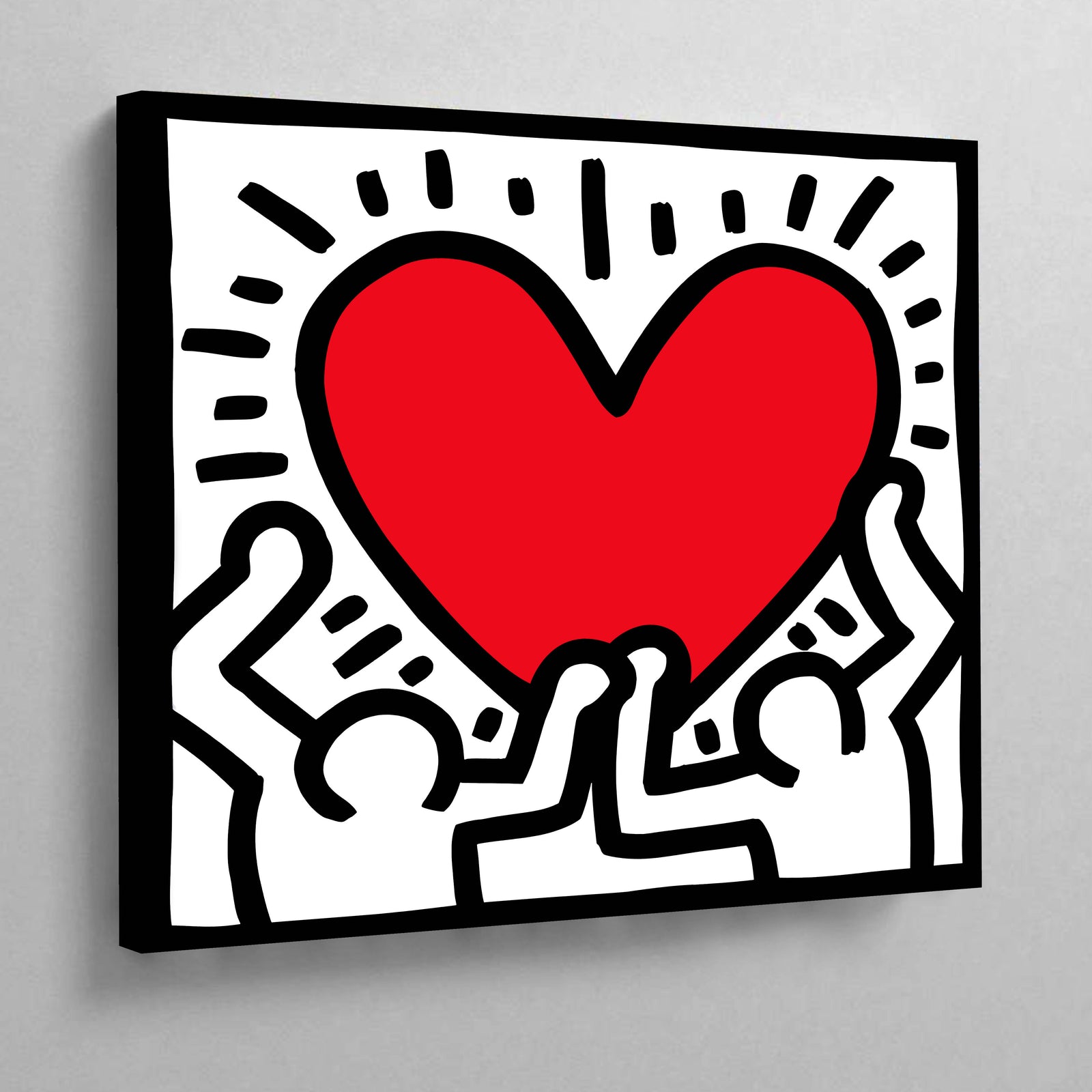 Tableau Coeur Keith Haring : Cœur rouge vif soulevé par deux personnages, lignes noires audacieuses, impression sur toile de style pop art.